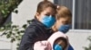 Patients walk in front of the Navy Hospital in Mexico City.