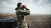 Новолуганський напрямок: на позиціях бойовиків – прапори СРСР та російських військових (відео)