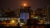 An explosion is seen in the sky over Kyiv during a Russian drone strike on January 3.