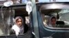 FILE: Afghan schoolgirls receive medical treatment outside a local hospital after being admitted for symptoms of poisoning in Herat in 2015.