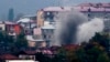 Smoke rises after shelling in Nagorno-Karabakh's main city, Stepanakert, on November 4.