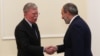 Acting Armenian Prime Minister Nikol Pashinian (right) with U.S. national-security adviser John Bolton in Yerevan on October 25.