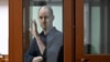 Evan Gershkovich in a courtroom in Yekaterinberg on June 26. 